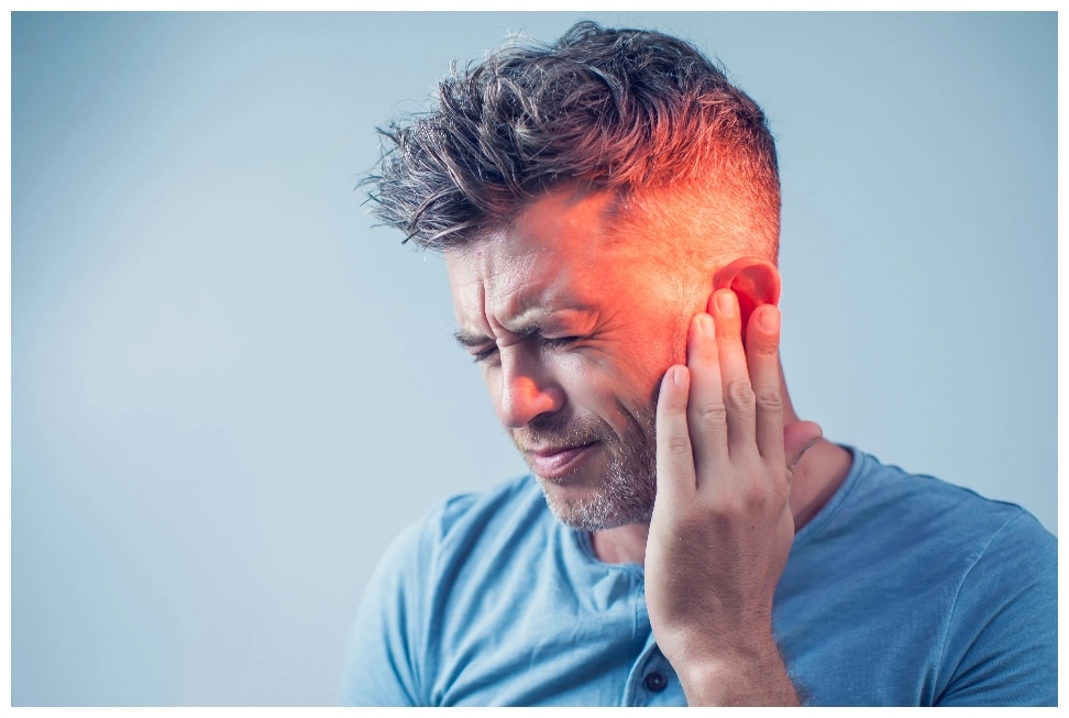 Man with tinnitus ear pain
